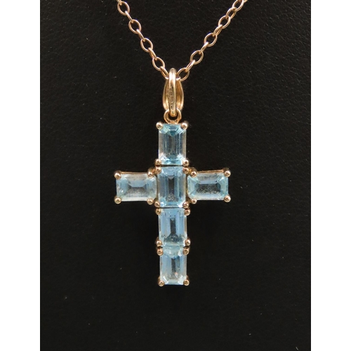 127 - Six Stone Emerald Cut Aquamarine Cross Pendant Set in 9 Carat Yellow Gold 3cm Drop Further Set on 9 ... 