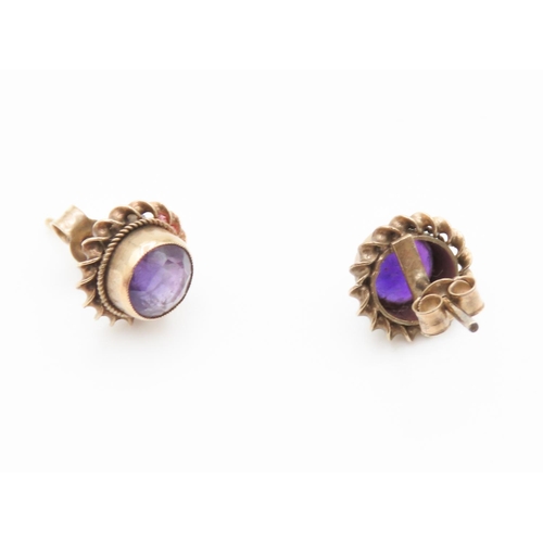 138 - Pair of Bezel Set Amethyst Earrings Mounted in 9 Carat Yellow Gold Each 1cm Diameter