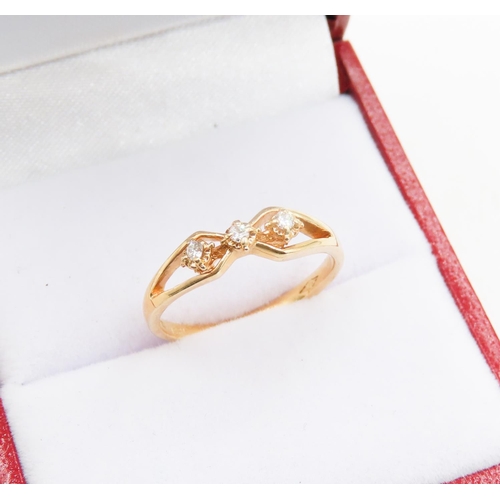 149 - Three Stone Diamond Set Bow Form Ring Mounted in 18 Carat Yellow Gold Ring Size L and a Half