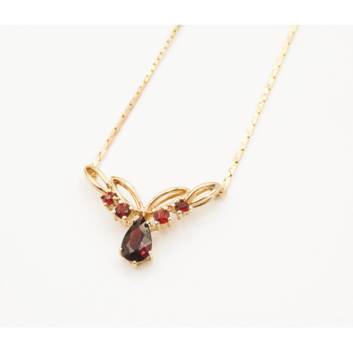 15 - Red Garnet Set Ladies Necklace Finely Detailed Mounted in 9 Carat Yellow Gold 42cm Long