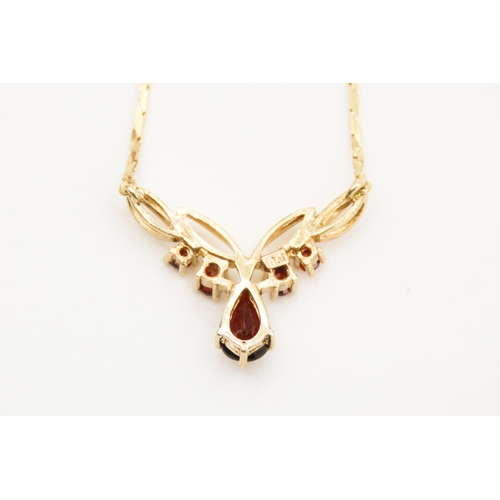 15 - Red Garnet Set Ladies Necklace Finely Detailed Mounted in 9 Carat Yellow Gold 42cm Long