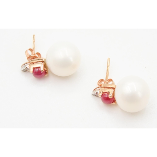 157 - Pair of Ruby and Diamond Set Pearl Earrings Mounted in 14 Carat Rose Gold Each 2cm High