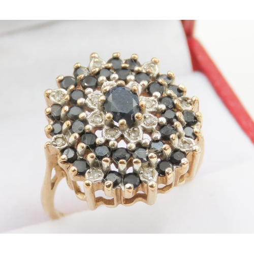 174 - Sapphire and Diamond Set Ladies Cluster Ring Finely Detailed Mounted on 9 Carat Yellow Gold Ring Siz... 