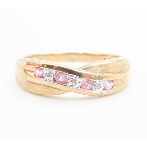 181 - Pink Tourmaline and Diamond Set Crossover Form Ring Mounted in 9 Carat Yellow Gold Ring Size P