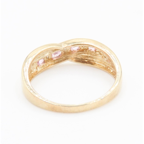 181 - Pink Tourmaline and Diamond Set Crossover Form Ring Mounted in 9 Carat Yellow Gold Ring Size P