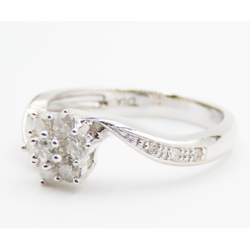 197 - Diamond Set Ladies Cluster Ring Mounted in 9 Carat White Gold Further Diamonds Set to Shoulders Ring... 