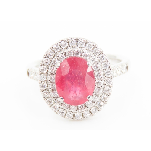 202 - Ruby Set Centre Stone Ring Mounted in Platinum with Diamond Set Double Halo Surround and Further Dia... 