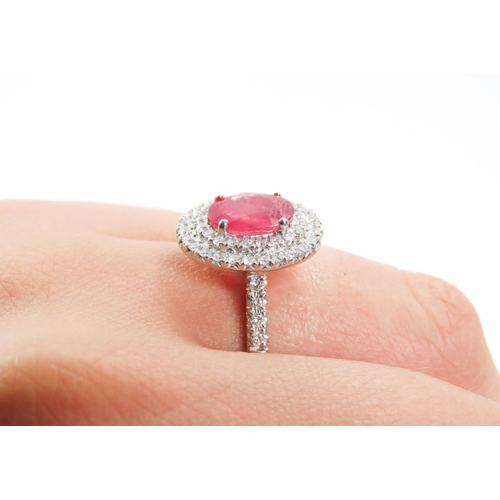 202 - Ruby Set Centre Stone Ring Mounted in Platinum with Diamond Set Double Halo Surround and Further Dia... 