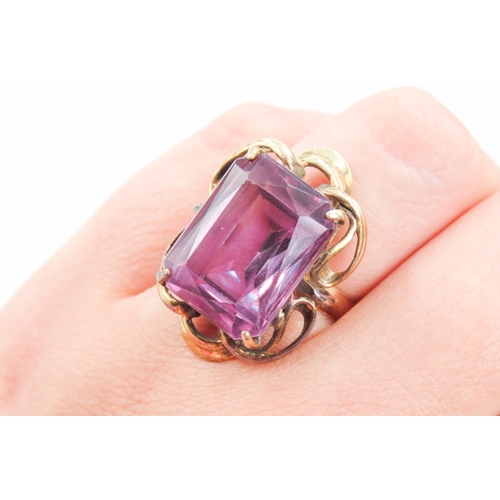 204 - Attractively Detailed Emerald Cut Amethyst Set Single Stone Statement Ring Mounted in 9 Carat Yellow... 