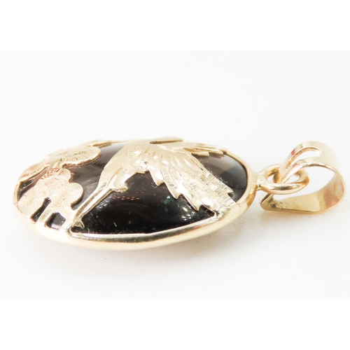 207 - Finely Detailed Smoky Quartz Pendant Bird Motif Mounted in 14 Carat Yellow Gold 2cm High