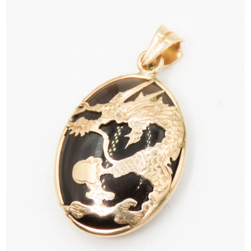 209 - Finely Detailed Smoky Quartz Pendant Dragon Motif Mounted in 14 Carat Yellow Gold 2.5cm High