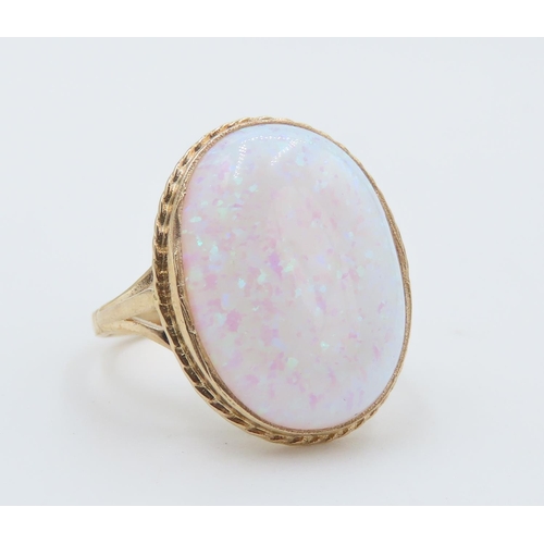 222 - Opal Set Single Stone Ring Mounted in 9 Carat Yellow Gold Ring Size N and a Half