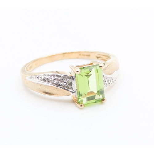 225 - Emerald Cut Peridot Set Ring Further Diamonds Set to Shoulders Mounted in 9 Carat Yellow Gold Ring S... 