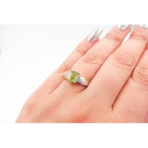 225 - Emerald Cut Peridot Set Ring Further Diamonds Set to Shoulders Mounted in 9 Carat Yellow Gold Ring S... 