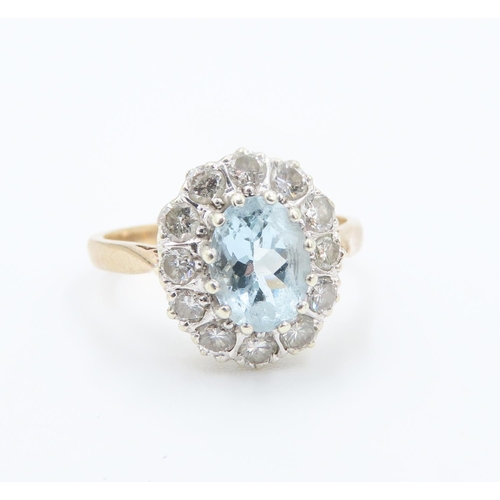 227 - Aquamarine Centre Stone Ring with Diamond Set Halo Surround Mounted in 9 Carat Yellow Gold Ring Size... 