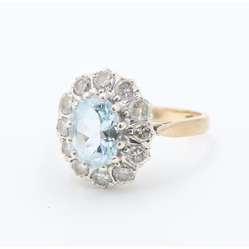 227 - Aquamarine Centre Stone Ring with Diamond Set Halo Surround Mounted in 9 Carat Yellow Gold Ring Size... 