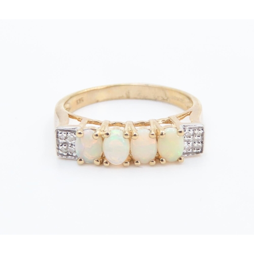 233 - Four Stone Opal Set Ring Mounted in 9 Carat Yellow Gold Further Diamonds Set to Shoulders Ring Size ... 