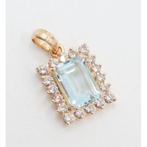 252 - Emerald Cut Aquamarine of 6 Carats Approximately  Pendant with Diamond Set Halo Surround Mounted in ... 