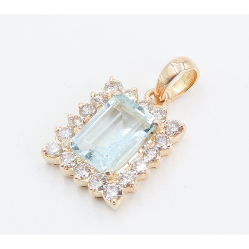 252 - Emerald Cut Aquamarine of 6 Carats Approximately  Pendant with Diamond Set Halo Surround Mounted in ... 