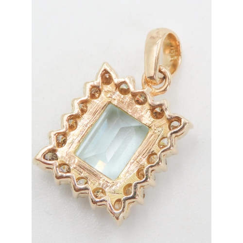 252 - Emerald Cut Aquamarine of 6 Carats Approximately  Pendant with Diamond Set Halo Surround Mounted in ... 