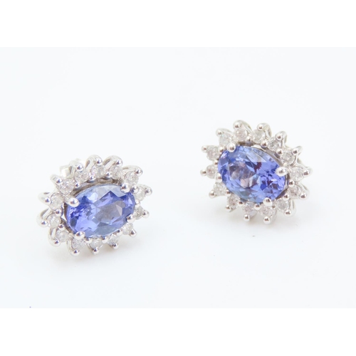 253 - Pair of AAA Grade Tanzanite and Diamond Set Ladies Cluster Earrings Mounted in 18 Carat White Gold E... 