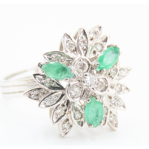 269 - Emerald and Diamond Floral Design Cluster Ring Mounted on 18 Carat White Gold Attractively Detailed ... 