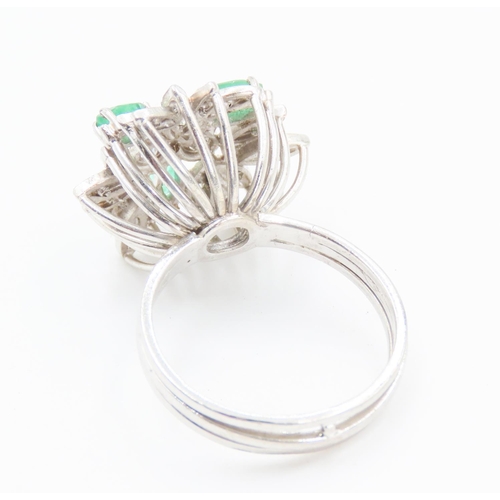 269 - Emerald and Diamond Floral Design Cluster Ring Mounted on 18 Carat White Gold Attractively Detailed ... 