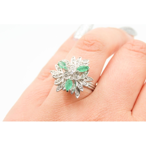 269 - Emerald and Diamond Floral Design Cluster Ring Mounted on 18 Carat White Gold Attractively Detailed ... 