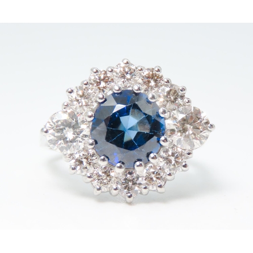 33 - Sapphire Centre Stone Ring with Round Brilliant Cut Diamond Set Halo Surround Mounted in Platinum To... 