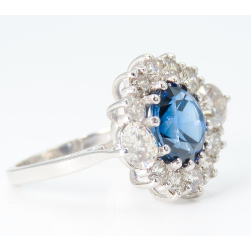 33 - Sapphire Centre Stone Ring with Round Brilliant Cut Diamond Set Halo Surround Mounted in Platinum To... 