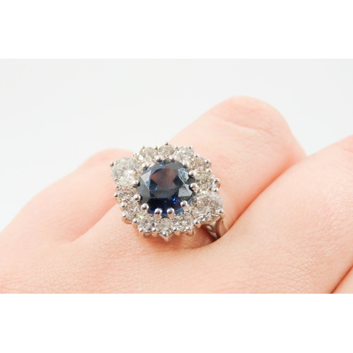 33 - Sapphire Centre Stone Ring with Round Brilliant Cut Diamond Set Halo Surround Mounted in Platinum To... 