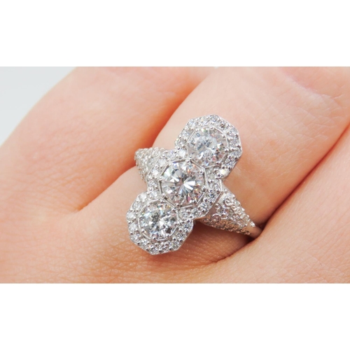 34 - Diamond Three Stone Ring Mounted in Platinum Further Diamond Set Surround Diamonds Set to Shoulders ... 