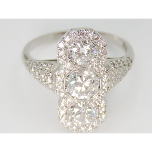 34 - Diamond Three Stone Ring Mounted in Platinum Further Diamond Set Surround Diamonds Set to Shoulders ... 