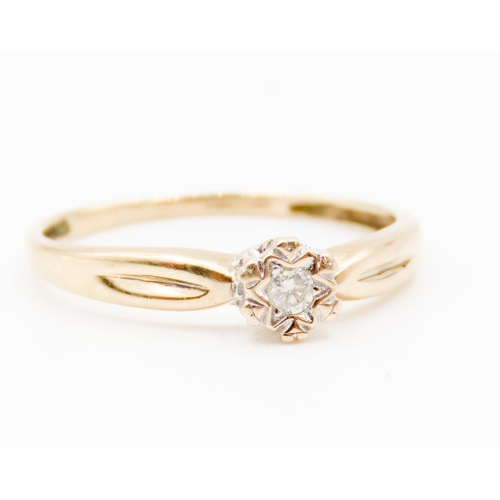 37 - Diamond Solitaire Star Shaped Rubbover Setting Mounted in 9 Carat Yellow Gold Ring Size M and a Half