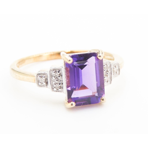 452 - Emerald Cut Amethyst Ring Set in 9 carat Yellow Gold Diamonds Set to Shoulders Ring Size N