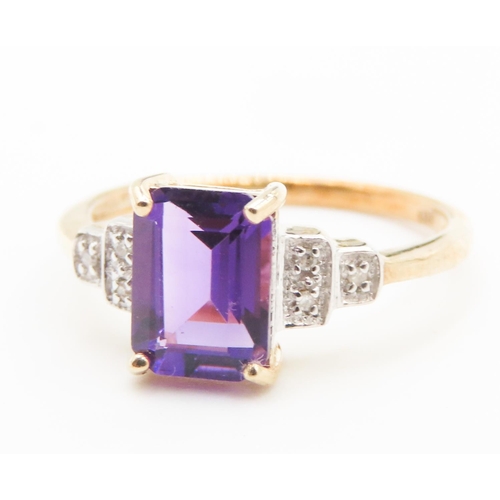 452 - Emerald Cut Amethyst Ring Set in 9 carat Yellow Gold Diamonds Set to Shoulders Ring Size N