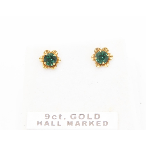 466 - Pair of Gemstone set 9 Carat Yellow Gold Floral Form Earrings