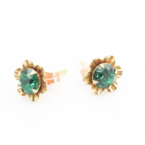 466 - Pair of Gemstone set 9 Carat Yellow Gold Floral Form Earrings