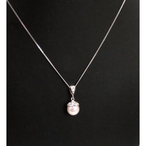 471 - Pearl and Diamond Set Pendant 2cm Drop Mounted in 18 Carat White Gold Finely Detailed Further Set on... 