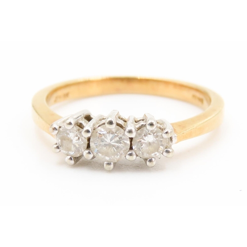 483 - Basket Set Diamond Three Stone Ring Mounted in 18 Carat Yellow Gold Ring Size O