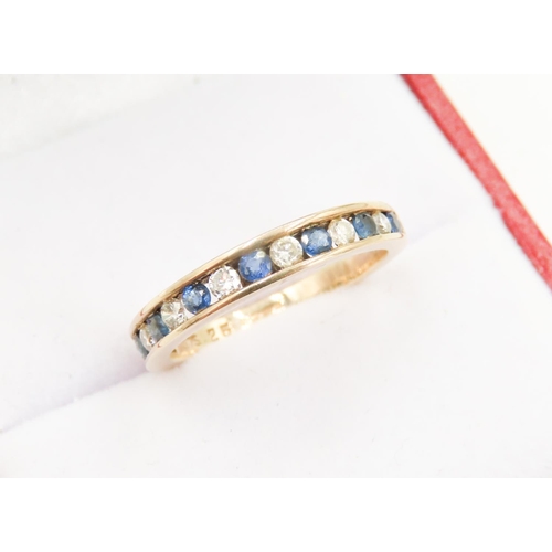 484 - Sapphire and Diamond Set Half Eternity Ring Mounted in 9 Carat Yellow Gold Ring Size L