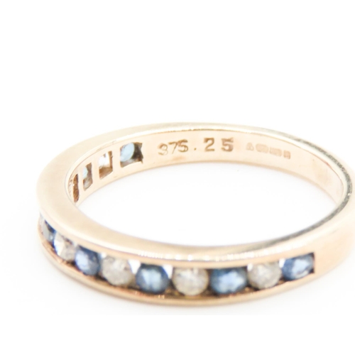 484 - Sapphire and Diamond Set Half Eternity Ring Mounted in 9 Carat Yellow Gold Ring Size L