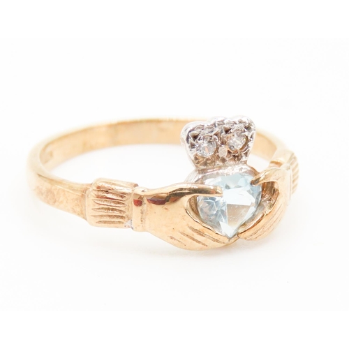 495 - Aquamarine and Diamond Set Claddagh Ring Mounted in 9 Carat Yellow Gold Ring Size P