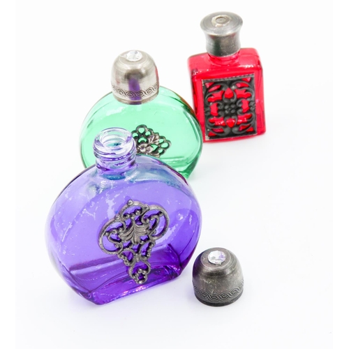 78 - Three Perfume Bottles Green Purple and Red Glass Attractively Detailed Silver Set Tallest 5.5cm High