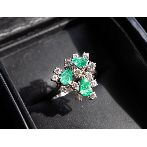 103 - Three Stone Pear Cut Emerald and Diamond Set Cluster Ring Set in 14 Carat White Gold Finely Detailed... 