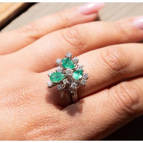 103 - Three Stone Pear Cut Emerald and Diamond Set Cluster Ring Set in 14 Carat White Gold Finely Detailed... 