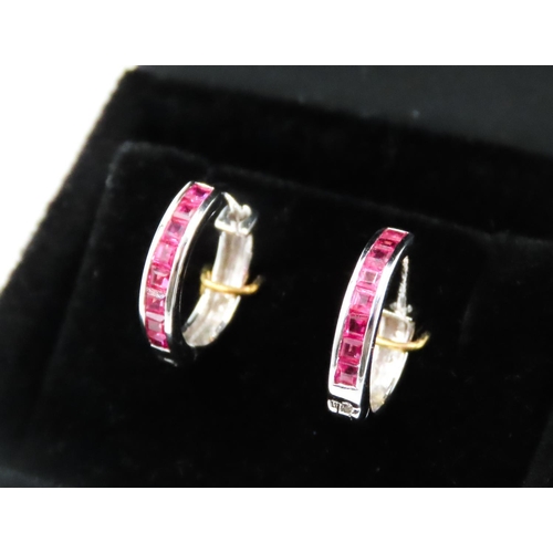 107 - Pair of Ruby Set Hoop Earrings Mounted in 18 Carat White Gold 11mm High