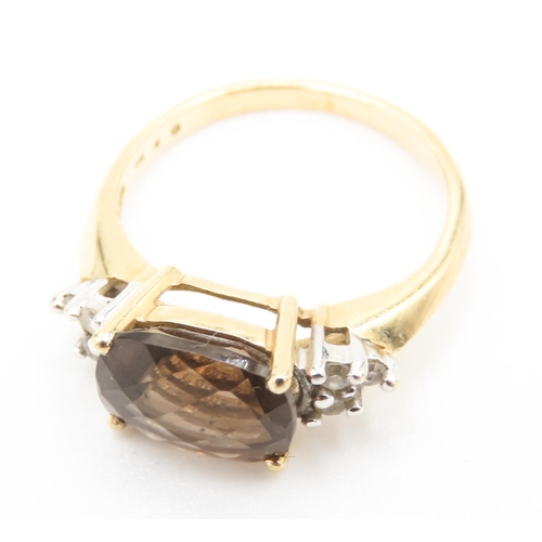 115 - Facet Cut Smoky Quartz Ring Mounted in 14 Carat Yellow Gold Further Diamonds Set to Shoulders Ring S... 