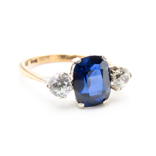 118 - Sapphire and Gemstone Set Three Stone Ring Mounted in 9 Carat Yellow Gold Ring Size N and a Half