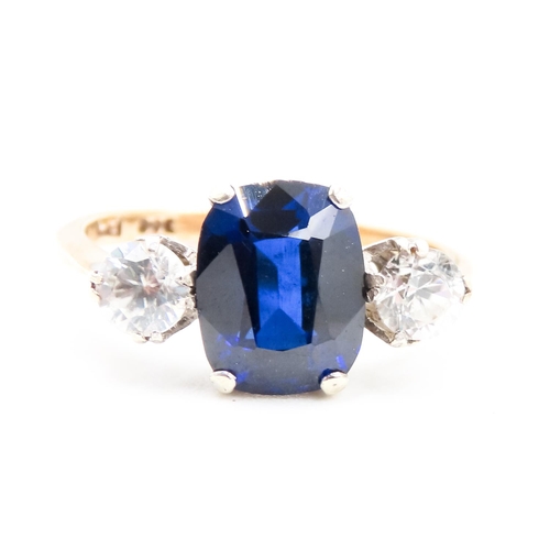 118 - Sapphire and Gemstone Set Three Stone Ring Mounted in 9 Carat Yellow Gold Ring Size N and a Half